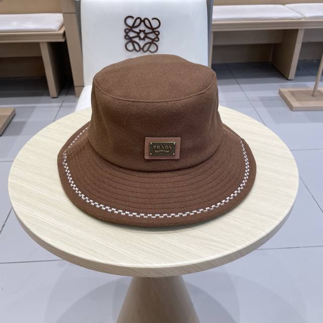 Prada普拉达2025新款法式赫本风盆帽双面呢羊毛韩版波浪刺绣渔夫帽女秋冬百搭