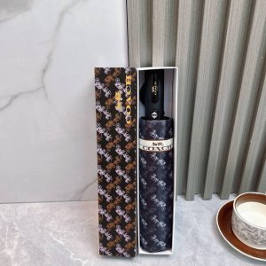 Coach 蔻驰 夏季新款 2025全自动折叠晴雨伞 黑色涂层防晒有效阻隔紫外线99% Upf 50 所以能起到伞下体感降温的效果 有效隔热 高效防晒 一把搞定