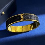 ys92 Ysl圣罗兰杨树林光面字母欧美时尚百搭Pu黑皮革手镯 黄铜材料 金色 内直径约6Cm*4.7Cm 面宽约1.43Cm 重约35.84G
