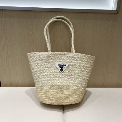 prada普拉达优袋库菜篮子编织包女2025夏海边度假沙滩草编包大容量单肩水桶包包尺寸：上宽40X 下宽23X 30Cm