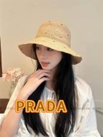 prada普拉达手工勾织拉菲草帽子女春夏出游度假大檐防晒帽显脸小遮阳渔夫帽潮