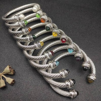 david Yurman 7Mm旋转头手镯。紫钻、红钻、蓝钻、黑钻、黄钻、深绿钻、浅绿钻、香槟钻、褐色钻珍珠十个款式。建议适合佩戴的手围15-20Cm 编号Dy