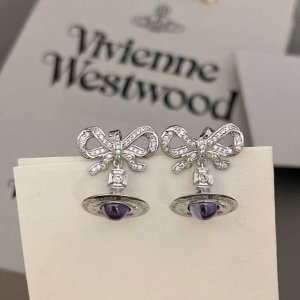 p70高品质 细节如图【Vivi 蝴蝶结立体土星耳钉】Z 1960，绝美太梦幻了紫色跟黄色两个颜色！宝宝，什么是快乐星球，来，这就是快乐星球！绝美土星手链项链！