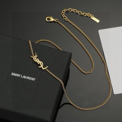ysl 圣罗兰 项链原装黄铜材质 Yves Saint Laurent 创立于1961年 优雅抽象大胆别致的设计风格使它成为奢华时尚界著名的品牌之一。引领精致、