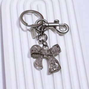 Coach 蝴蝶结钥匙扣包包挂饰 质感很棒 很可爱 配盒子