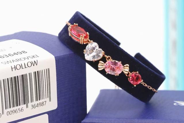 施华洛Swarovski 甜蜜糖果 彩色水晶抽拉式手链 这款属于Gema 520产品系列的链坠专为表达爱意而设，陪您度过浓情蜜意的情人节P以蜡笔色调展示趣致的糖