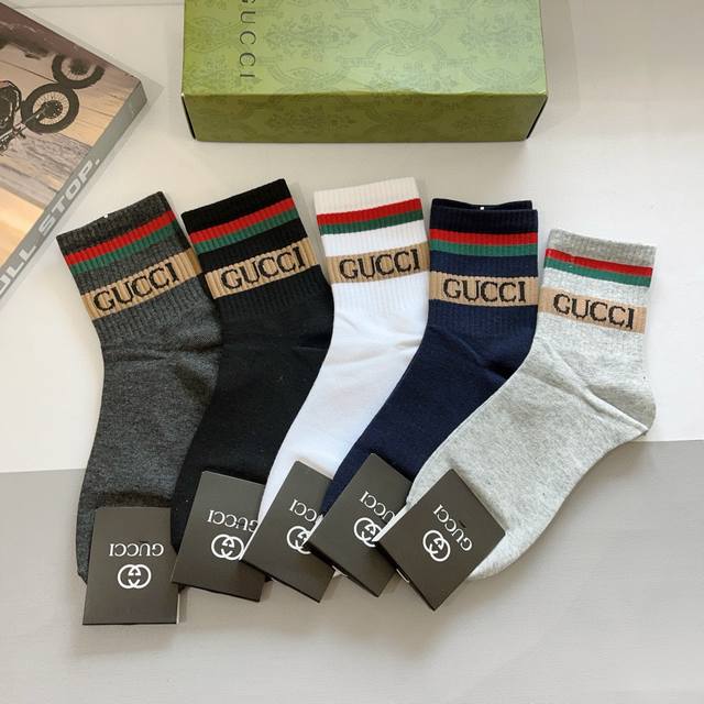 配包装 一盒5双 gucci 古奇 新款中筒男士袜子 纯棉面料 火爆Logo图案 专柜同步中长筒袜子 大牌出街 潮人必备超好搭配