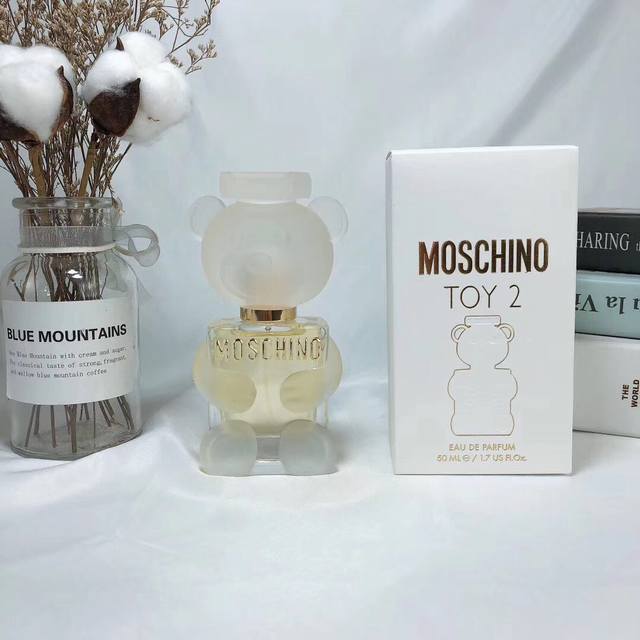 专柜品质Moschino 梦仙奴 莫斯奇诺 Toy 2泰迪熊小熊女士香水Ed Ml前调：橘子、苹果、玉兰中调：牡丹、白醋栗、茉莉基调：檀木、琥珀木 、麝香