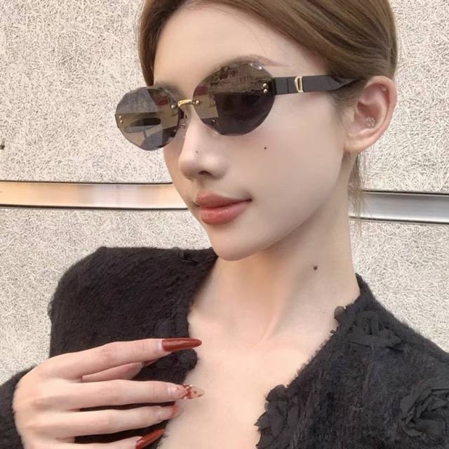 Dio*辣妹墨镜女美式网红款椭圆无边框小脸个性防紫外线遮阳太阳眼镜