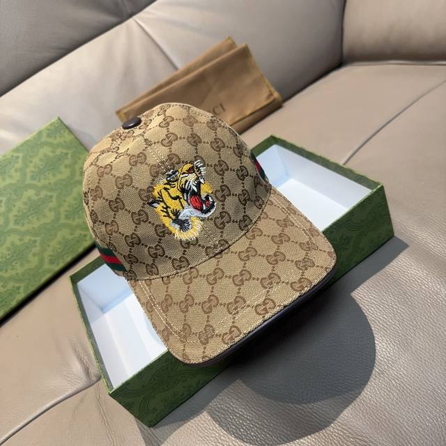 配盒子布袋，Gucci 古奇 新款原单棒球帽， 虎头刺绣，1:1开模订制，重工刺绣，细节可媲美专柜，原版帆布料+头层牛皮，质量超赞！帅男靓女首选，时尚百搭。基础