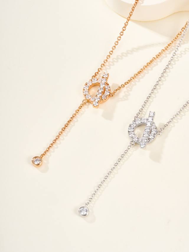 p价 H家Finesse玫瑰金钻石Y型项链，手链，无与伦比的美丽Mini镂空圆圈上落一根小棍子，非常精致，这个系列的特征就是每颗钻都凸显的特别饱满闪耀，排列的也