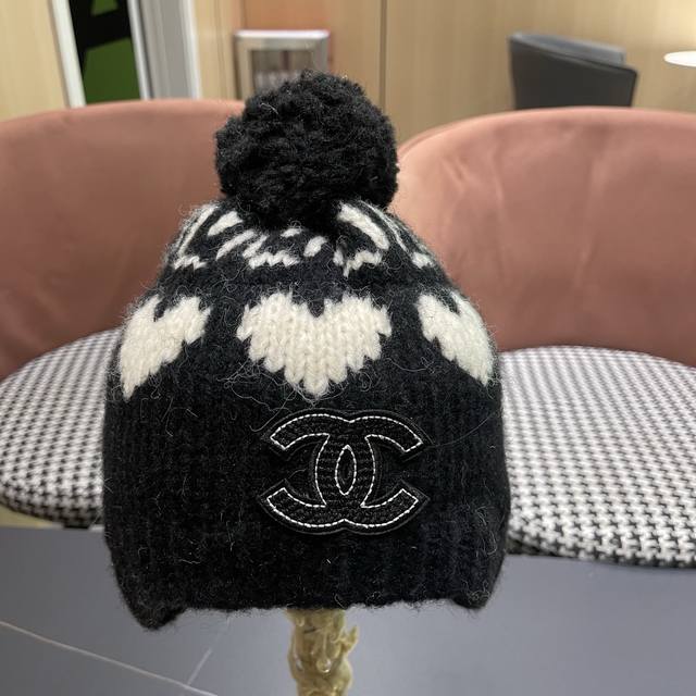 Chanel香奈儿 韩系菲尔岛风爱心毛球针织帽秋冬季复古百 搭显脸小保暖护耳毛线帽