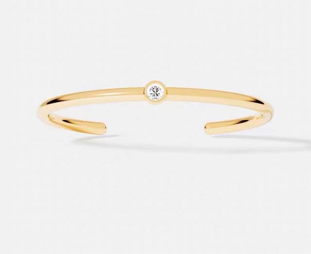 Apm Monaco éClat手镯金黄色圆圈经典密镶设计感手饰。